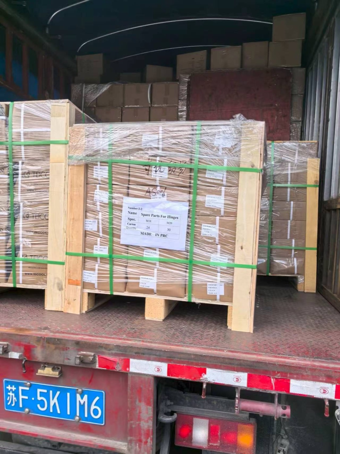 Wooden export crates palletised and strapped for shipment