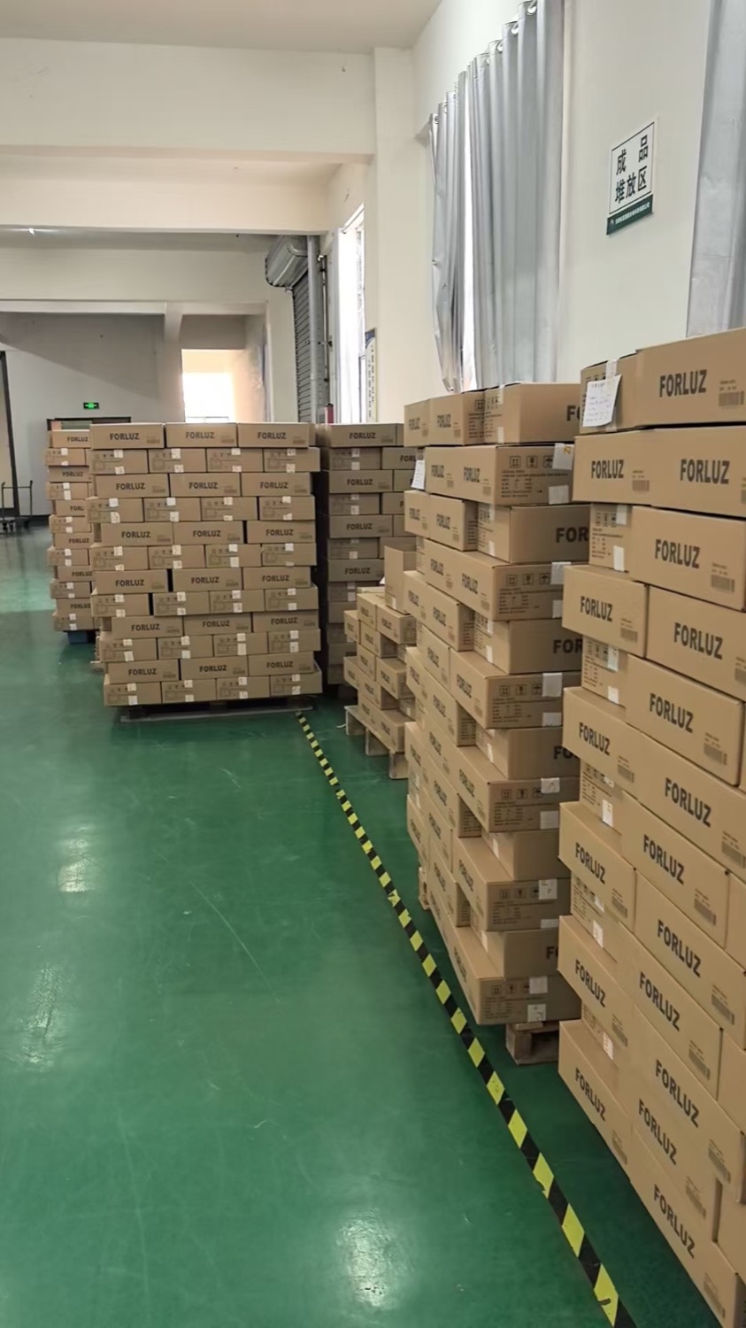 Finished LED lighting goods palletised and boxed in the warehouse
