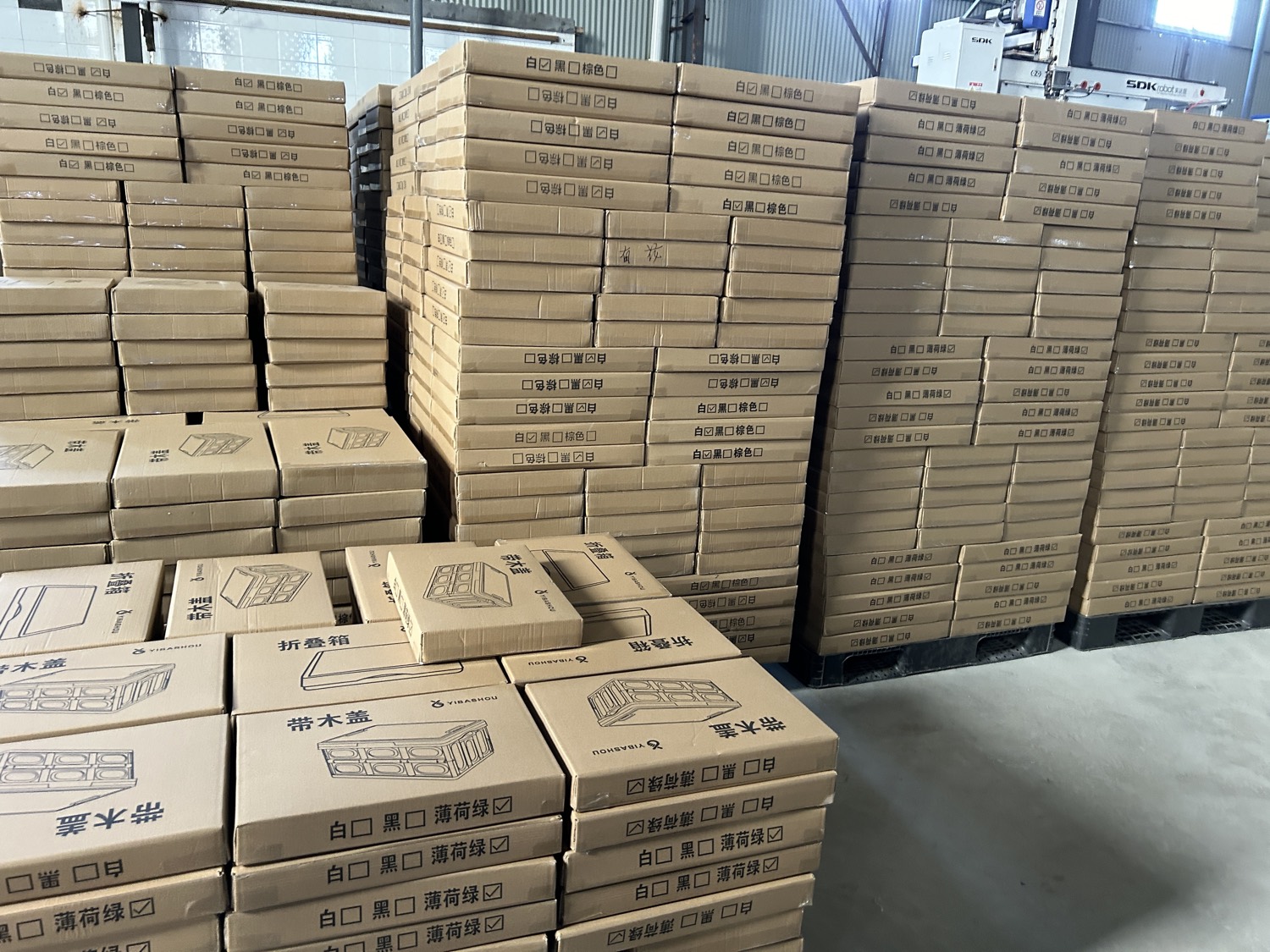 Palletised cartons of finished plastic products in inventory
